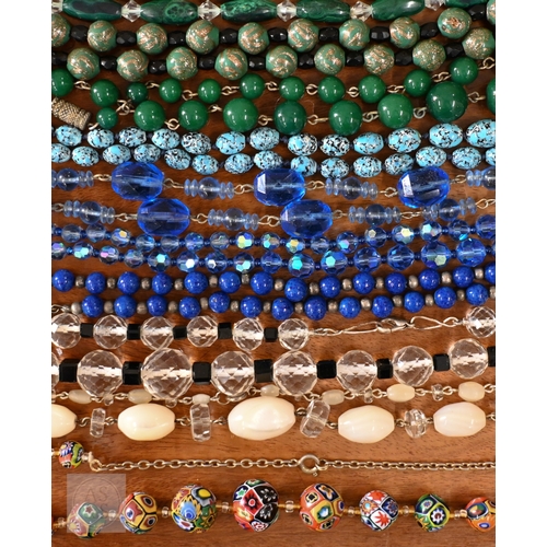 454 - A selection of twenty three glass bead, stone and other costume jewellery necklaces, contained in a ... 