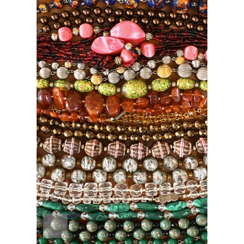 454 - A selection of twenty three glass bead, stone and other costume jewellery necklaces, contained in a ... 