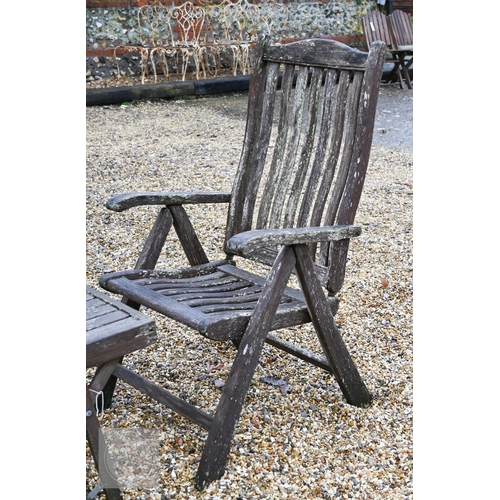 5 - Three weathered teak folding armchairs by Alexander Rose to/with a teak coffee table (4)