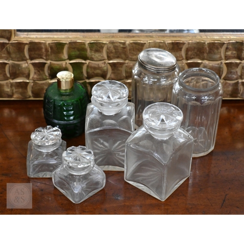 520 - A Victorian walnut toilet case with part fittings, marbles, etc