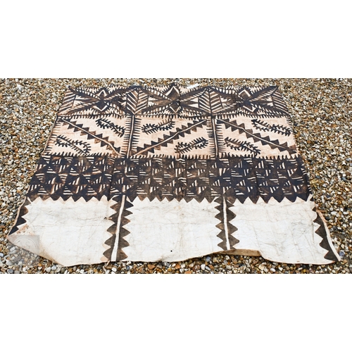 528 - An African carved wood stool with geometric patterned decoration, 39 x 53 cm, to/w a painted fibre p... 