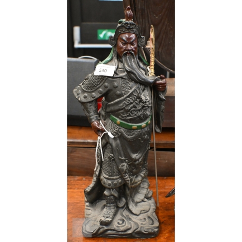 530 - A cast resin figure of a Chinese Immortal, to/w a brass pilgrim's bell, a bell-weight, etc