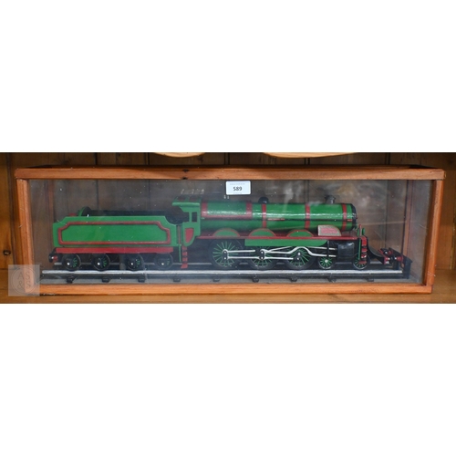 589 - A painted wood model train in glazed case, 67 cm long o/a