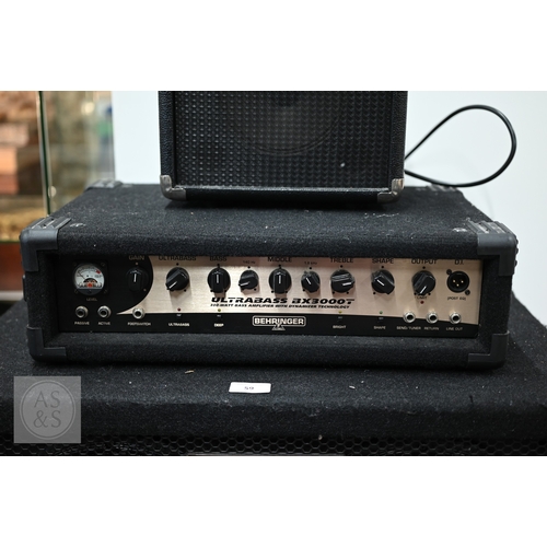 59 - A Behringer BA410 Ultrabass amplifier, date code 0410 t0/with a Behringer Ultrabass AX3000 bass amp,... 