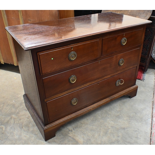 89 - An early 20th century walnut Maple & Co chest of two short over two long drawers with floral bra... 