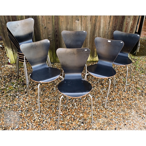 9 - A set of ten black faced laminated plywood stacking chairs, with chrome legs (10)