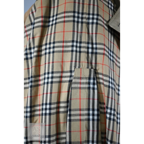 541 - Burberry's - A classic vintage men's double-breasted trench coat/mac with iconic checked lining, bel... 