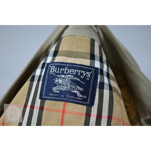 542 - Burberry's - A classic vintage men's double-breasted trench coat/mac with iconic checked lining, bel... 