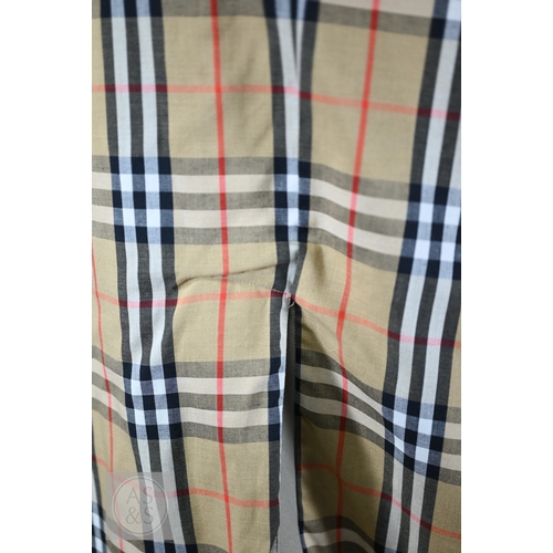 542 - Burberry's - A classic vintage men's double-breasted trench coat/mac with iconic checked lining, bel... 