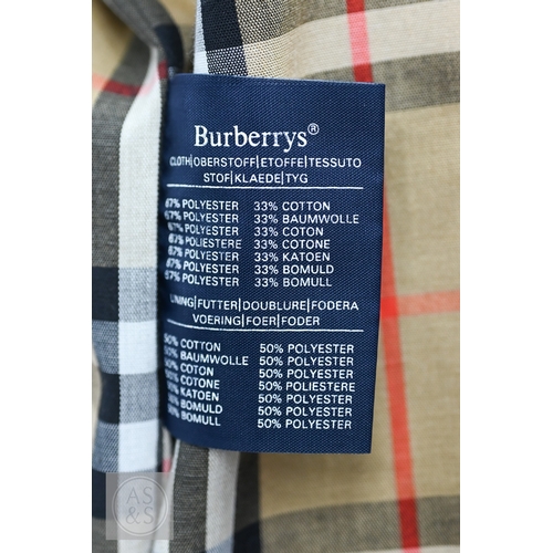 542 - Burberry's - A classic vintage men's double-breasted trench coat/mac with iconic checked lining, bel... 