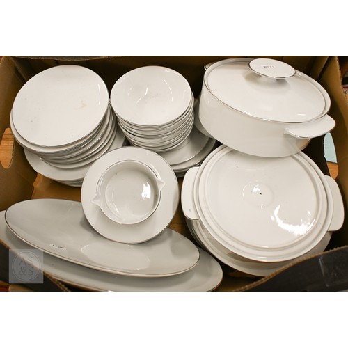 450 - A Thomas (Germany) white-glazed dinner service with silvered rims (box)