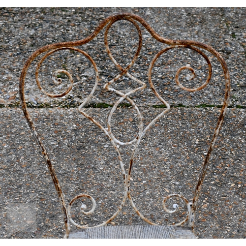 6 - A set of six weathered antique French wrought iron terrace chairs, with remnants of the original tim... 