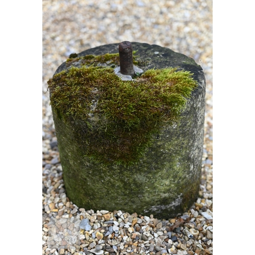 14 - A pair of antique stone post bases with central iron pins, 26 cm dia. x 24 cm h (2)