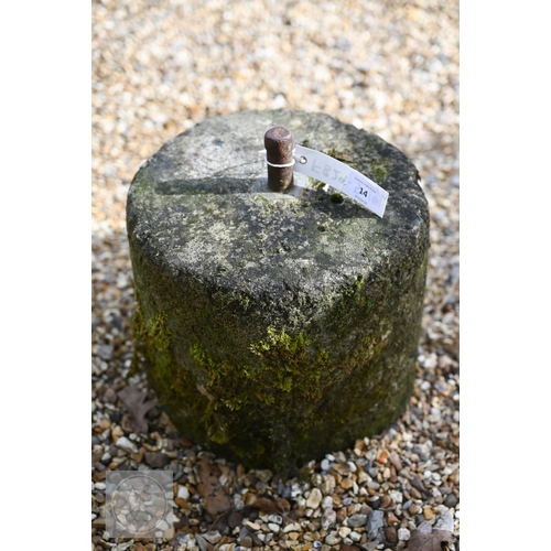 14 - A pair of antique stone post bases with central iron pins, 26 cm dia. x 24 cm h (2)