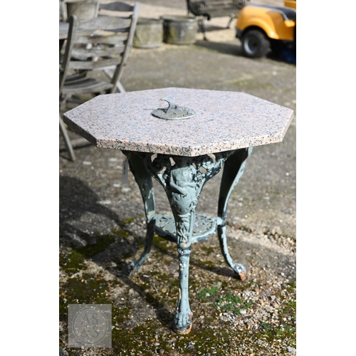 27 - A cast iron Britannia design terrace table with later octagonal pink granite top to/with a small 17t... 