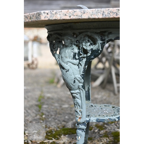 27 - A cast iron Britannia design terrace table with later octagonal pink granite top to/with a small 17t... 