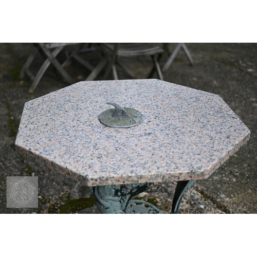 27 - A cast iron Britannia design terrace table with later octagonal pink granite top to/with a small 17t... 