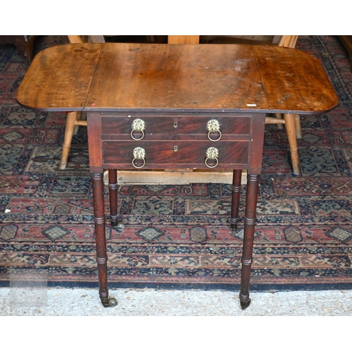 43 - A Victorian mahogany drop-leaf night table, with two drawers opposing a fall front and raised on rin... 