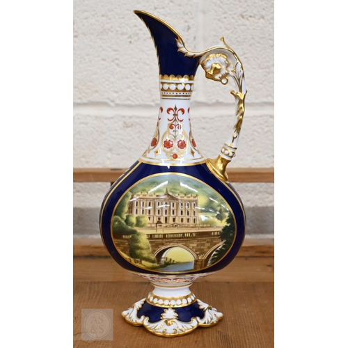 437 - A Royal Crown Derby china commemorative ewer, 'The Chatsworth Vase' painted with 'Cascade House' and... 