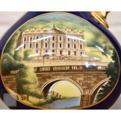 437 - A Royal Crown Derby china commemorative ewer, 'The Chatsworth Vase' painted with 'Cascade House' and... 