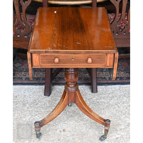 44 - A Victorian rosewood drop leaf tripod table, with single frieze drawer raised on a baluster turned s... 