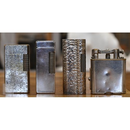514 - Four Dunhill silver plated cigarette lighters, to/w five Dunhill pipes (one with silver band) (9)