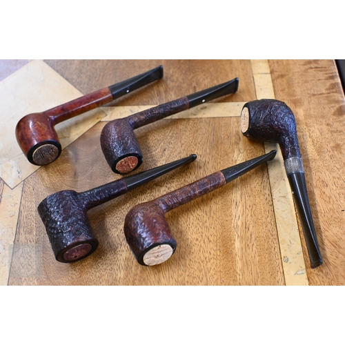 514 - Four Dunhill silver plated cigarette lighters, to/w five Dunhill pipes (one with silver band) (9)