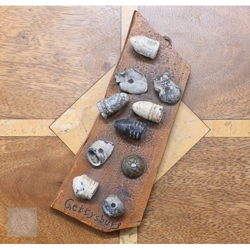 515 - American Civil War souvenir relic board mounted with .58 cal 3-ring minie ball bullets (dropped and ... 