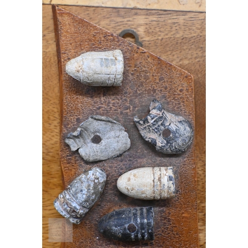515 - American Civil War souvenir relic board mounted with .58 cal 3-ring minie ball bullets (dropped and ... 