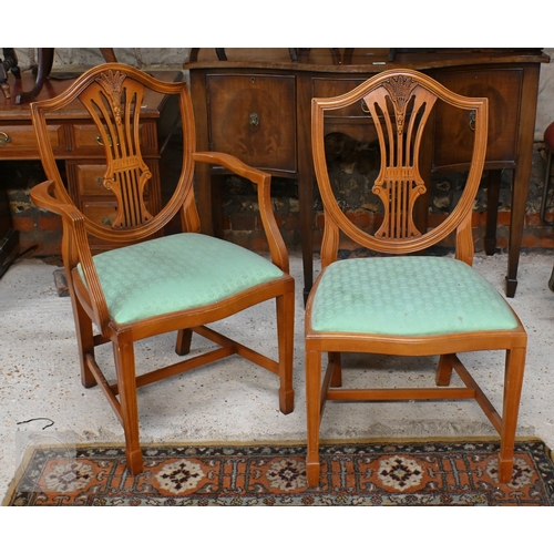 61 - # A Wade cross-banded yew veneer twin pedestal extending dining table, with two extra leaves, raised... 
