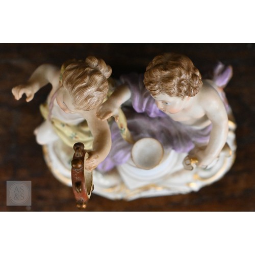 436 - A pair of late 19th/early 20th century Meissen groups of classically-draped gambolling putti, allego... 