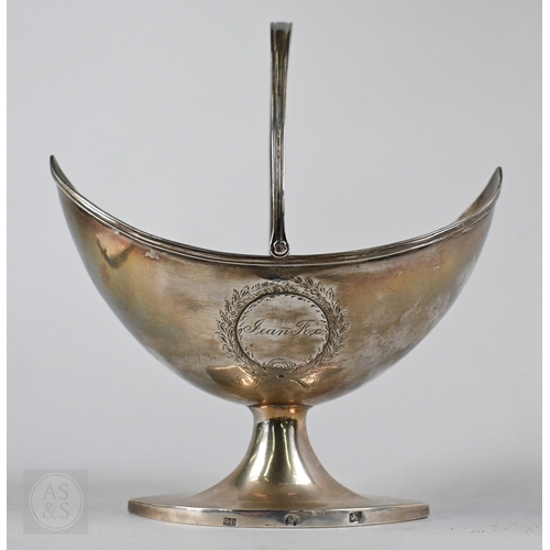 1 - A George III silver sugar basket of navette form, with swing handle and elliptical stemmed foot, mak... 