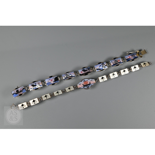 126 - A Norwegian enamel and white metal bracelet formed of eight enamelled plaques featuring Nordic scene... 