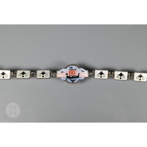 126 - A Norwegian enamel and white metal bracelet formed of eight enamelled plaques featuring Nordic scene... 
