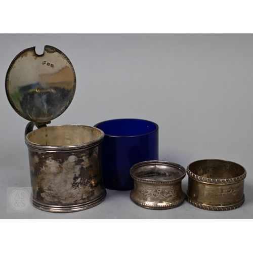 20A - A silver drum mustard, London 1927, to/w a George III fiddle pattern tablespoon, London 1800 (a/f), ... 