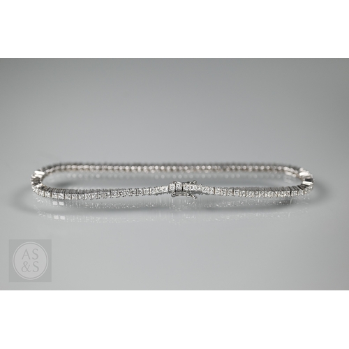 A diamond line/tennis bracelet set approx 92 princess cut diamonds in claw setting, concealed snap, 18ct white gold set, 18 cm long, 11.2 g all in