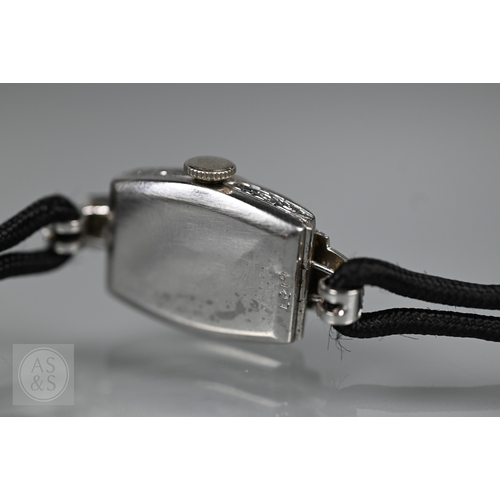 293 - An Art Deco platinum and diamond ladies cocktail watch, the Swiss MGM movement with circular Arabic ... 