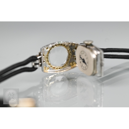 293 - An Art Deco platinum and diamond ladies cocktail watch, the Swiss MGM movement with circular Arabic ... 