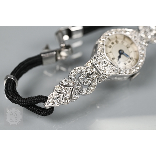 293 - An Art Deco platinum and diamond ladies cocktail watch, the Swiss MGM movement with circular Arabic ... 