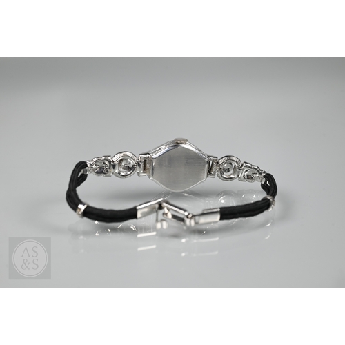 293 - An Art Deco platinum and diamond ladies cocktail watch, the Swiss MGM movement with circular Arabic ... 