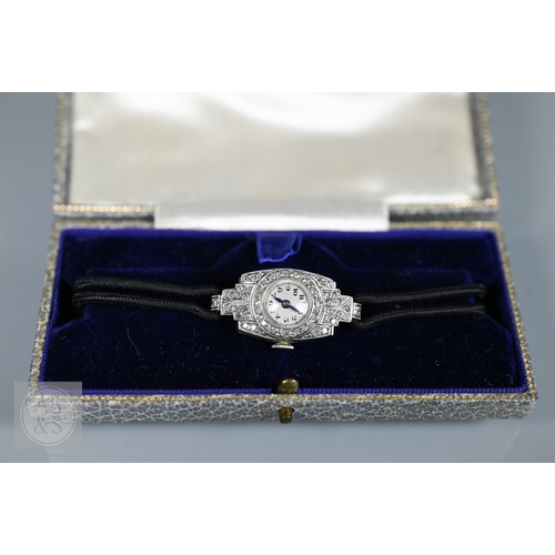 293 - An Art Deco platinum and diamond ladies cocktail watch, the Swiss MGM movement with circular Arabic ... 