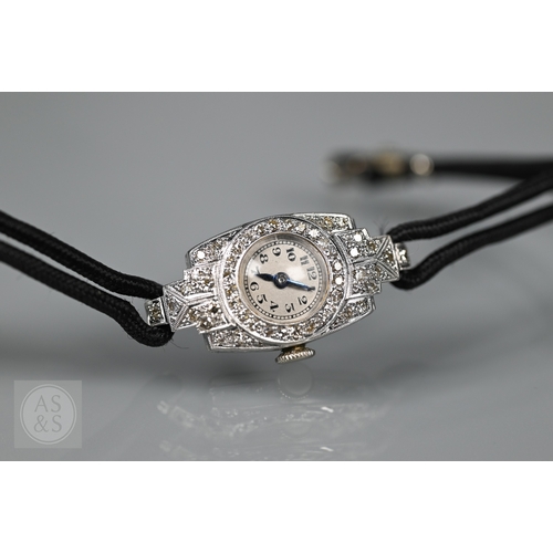 293 - An Art Deco platinum and diamond ladies cocktail watch, the Swiss MGM movement with circular Arabic ... 