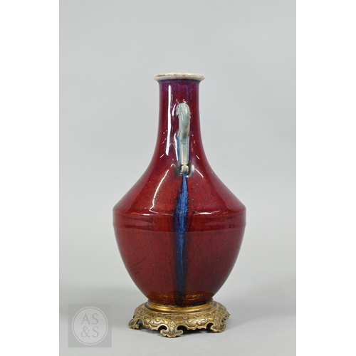 310 - A rare Chinese flambe glazed hu-form vase, Qianlong six-character imperial zhuanshu seal mark and of... 