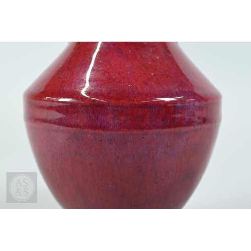 310 - A rare Chinese flambe glazed hu-form vase, Qianlong six-character imperial zhuanshu seal mark and of... 