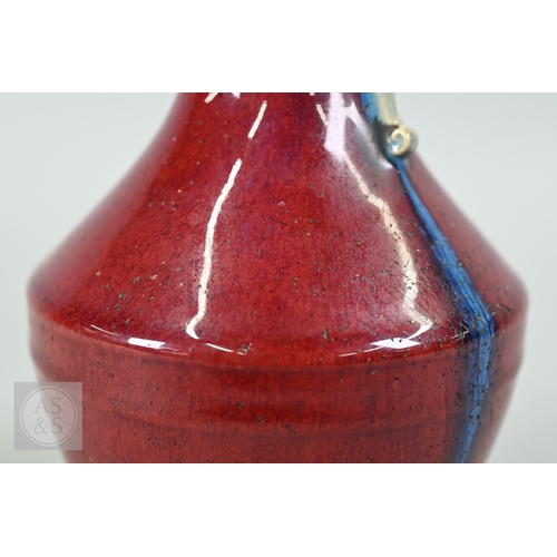 310 - A rare Chinese flambe glazed hu-form vase, Qianlong six-character imperial zhuanshu seal mark and of... 