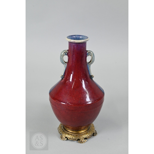 310 - A rare Chinese flambe glazed hu-form vase, Qianlong six-character imperial zhuanshu seal mark and of... 