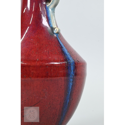 310 - A rare Chinese flambe glazed hu-form vase, Qianlong six-character imperial zhuanshu seal mark and of... 