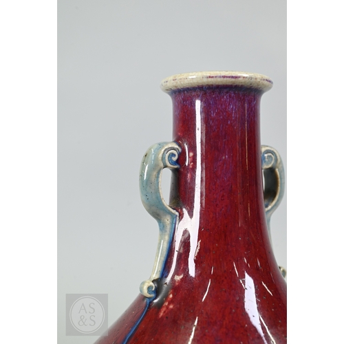 310 - A rare Chinese flambe glazed hu-form vase, Qianlong six-character imperial zhuanshu seal mark and of... 