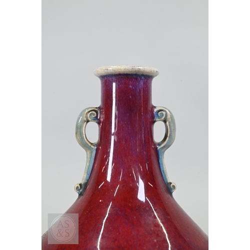 310 - A rare Chinese flambe glazed hu-form vase, Qianlong six-character imperial zhuanshu seal mark and of... 