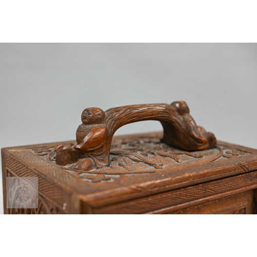 312 - An early-mid 20th century Chinese Mah Jong set, the wooden case decoratively carved with landscapes ... 